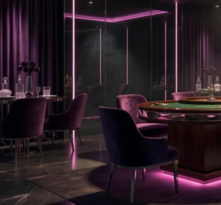 Décor moderne de roulette avec éclairage dramatique, verre fumé et ambiance de soirée privée.